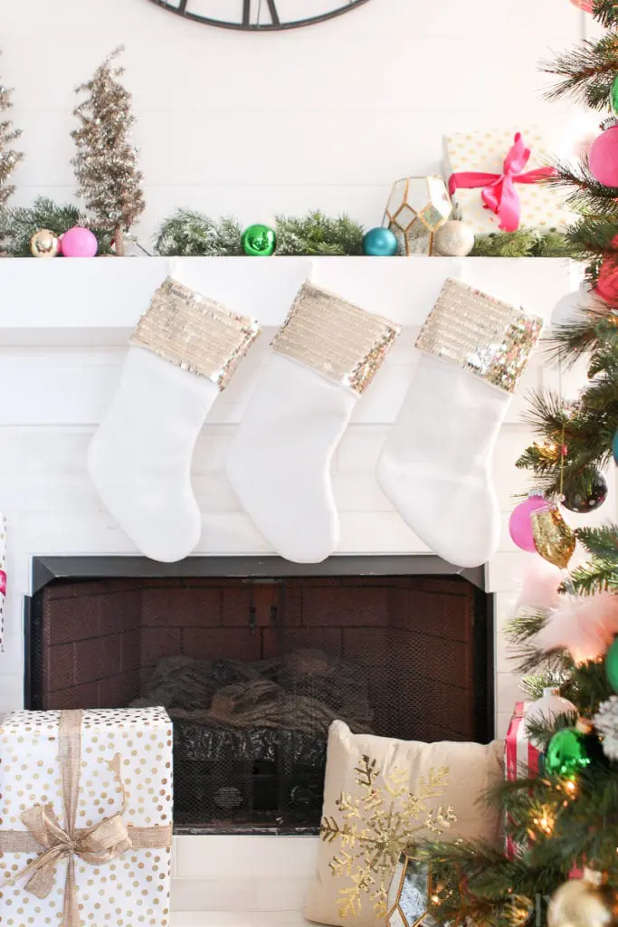 Gold sequined stockings on fireplace mantle
