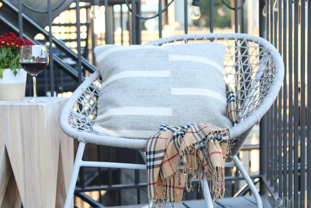 Use a fall scarf to add pattern to a chair or sofa