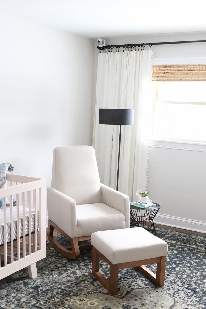 A neutral and comfortable rocker in a nursery