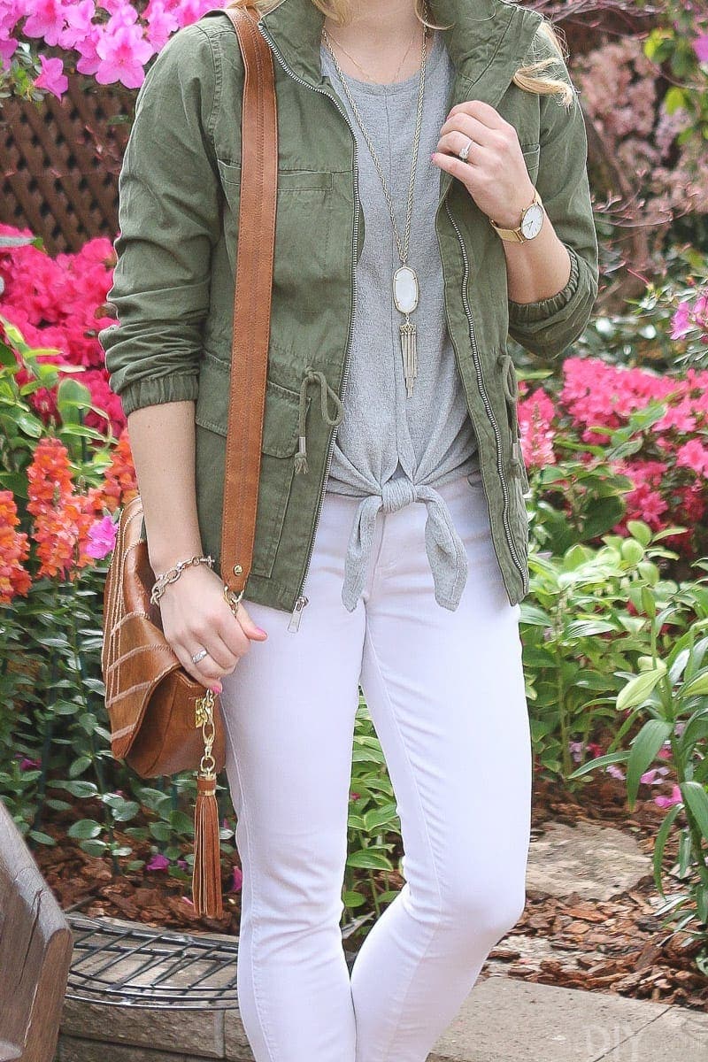 Add a green jacket over a neutral top for a cute spring look