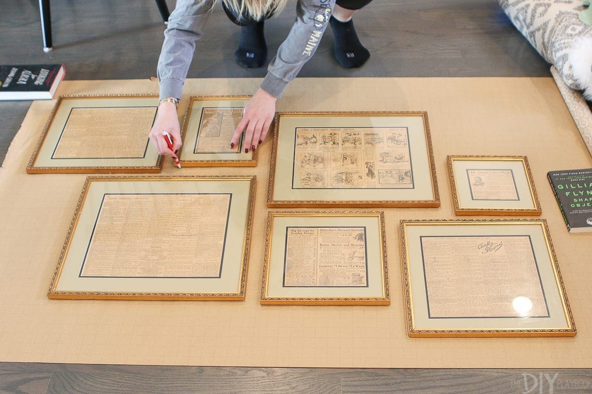 Tracing frames on wrapping paper to create a gallery wall layout. 