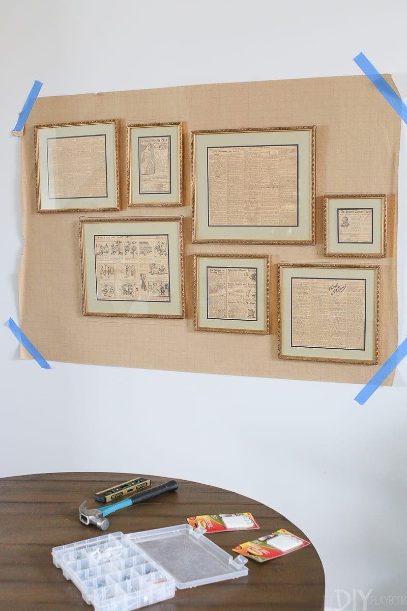 Use wrapping paper to create the layout when you hang a gallery wall