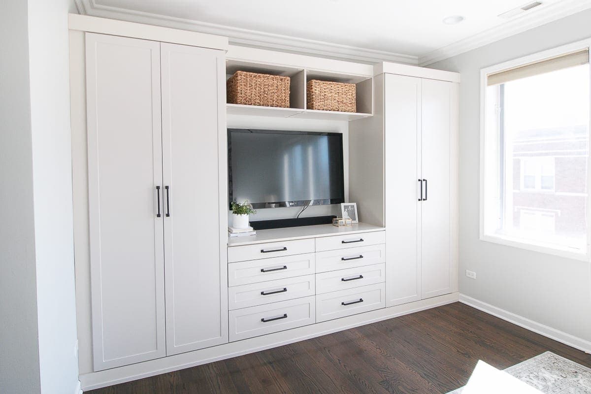 A wall of master bedroom built-ins takes this entire space to the next level. 