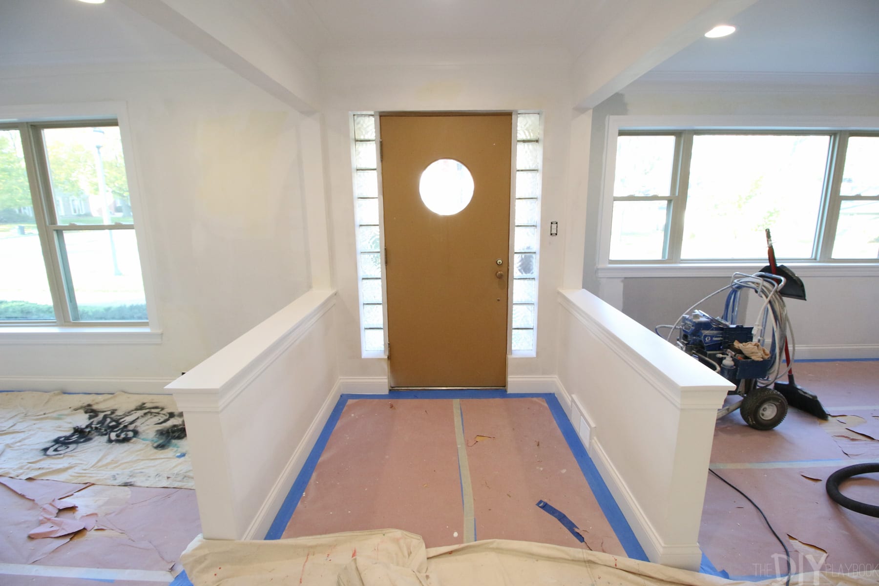 Beige front door with circle window