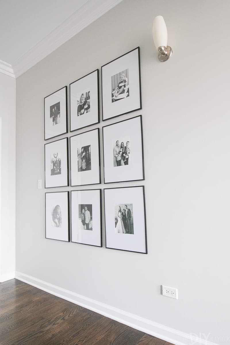 How to hang a group of symmetrical photo frames in your hallway