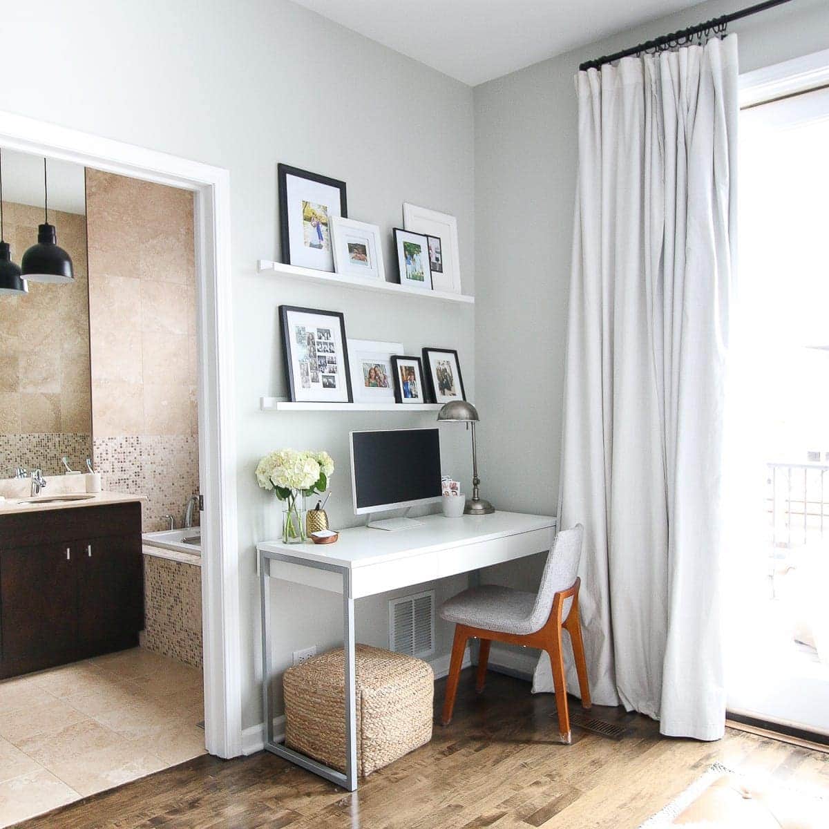 Desk space in a master bedroom. A tidy spot to get work done each day. 