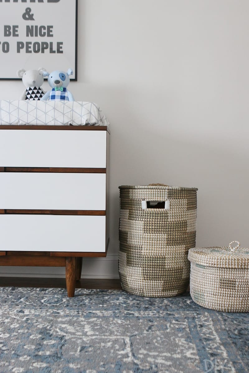 These woven baskets add hidden storage in the nursery. 