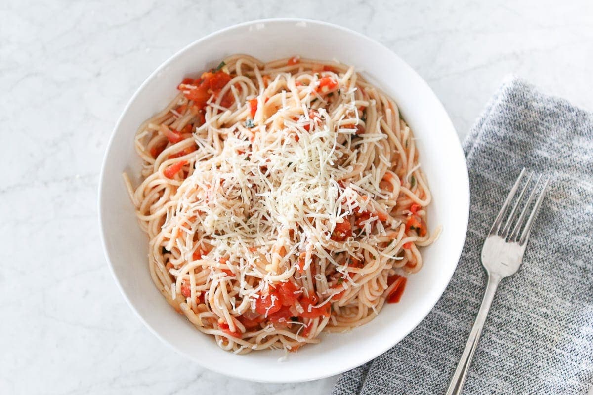 A fresh pasta recipe with grated parmesan cheese on top is the perfect dinner for Valentine's Day. 