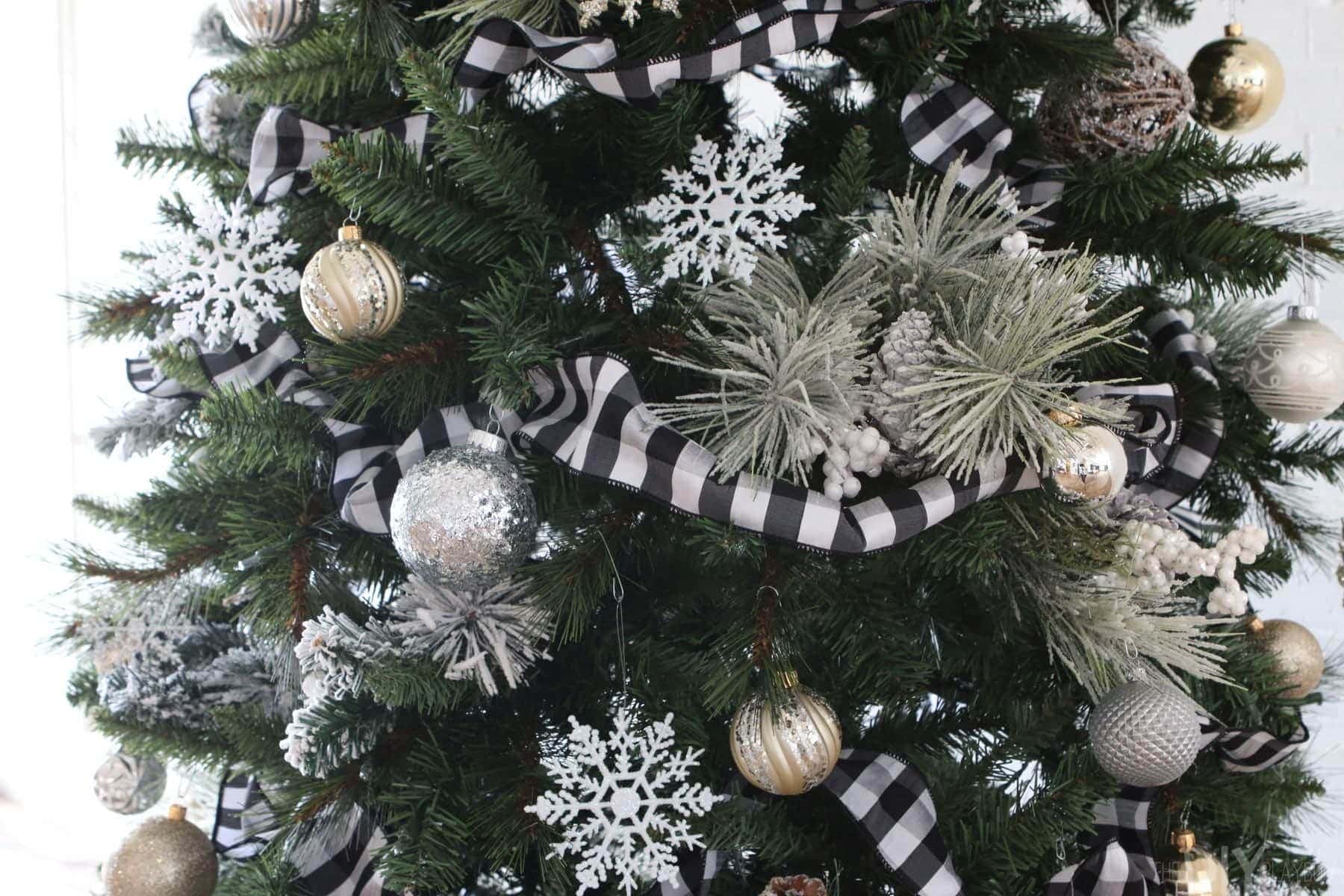 Our Black and White Tree got some added fullness in the branches from the flocked branches we stuffed in a few places. 