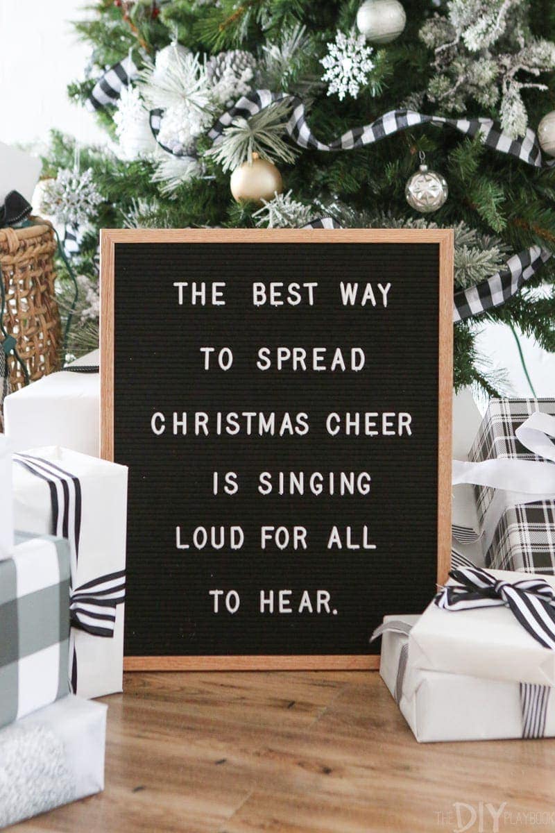 We love this black and white Christmas sign! "The Best Way To Spread Christmas CHeer Is Singing Loud For All To Hear."