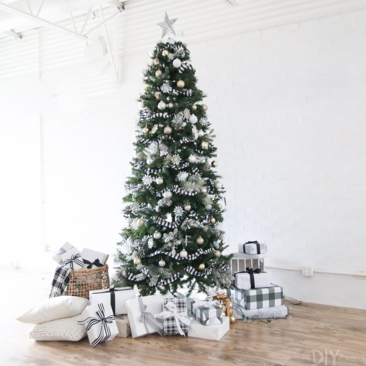 The full view of our black and white Christmas Tree, including the full array of presents underneath. 