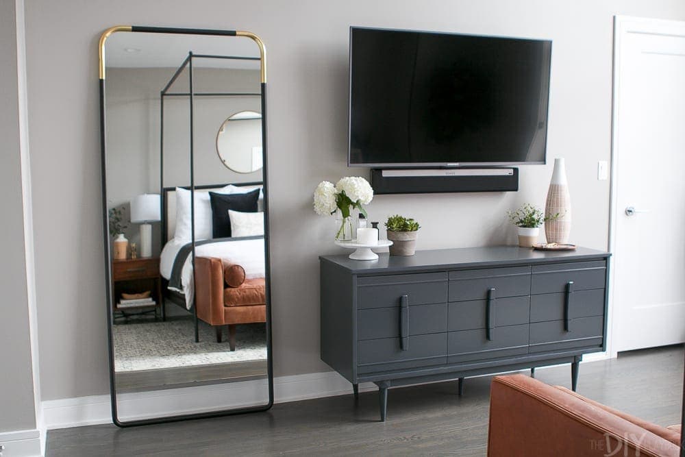 This repainted dresser is a great addition to the room. 