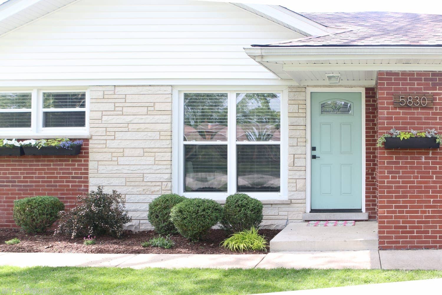 And after- new knobs and a black flower box, the house is ready!