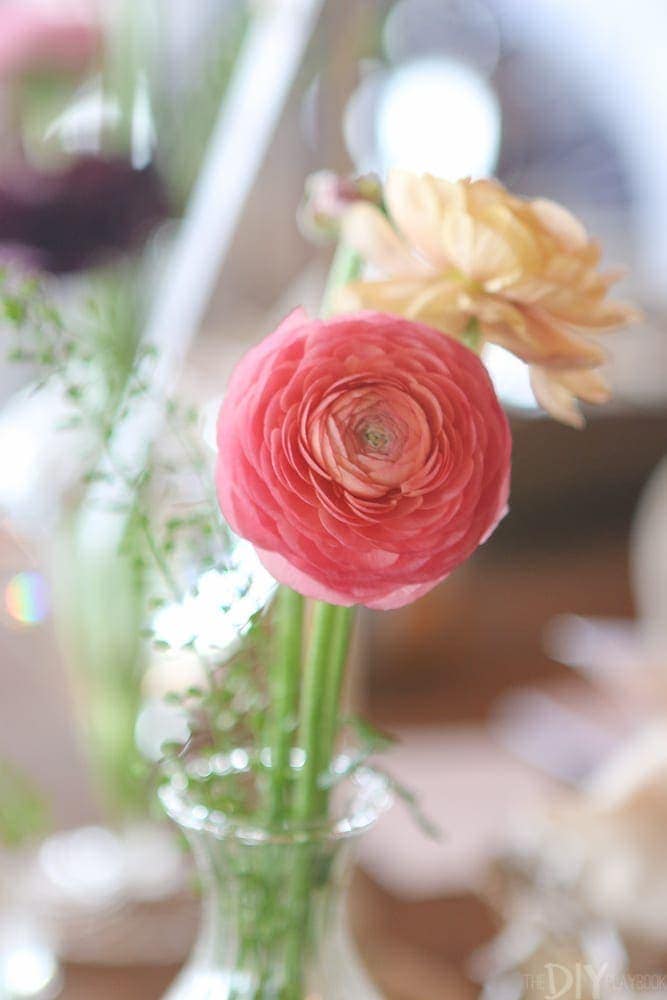 Flowers on table displays at Bloom Bash.