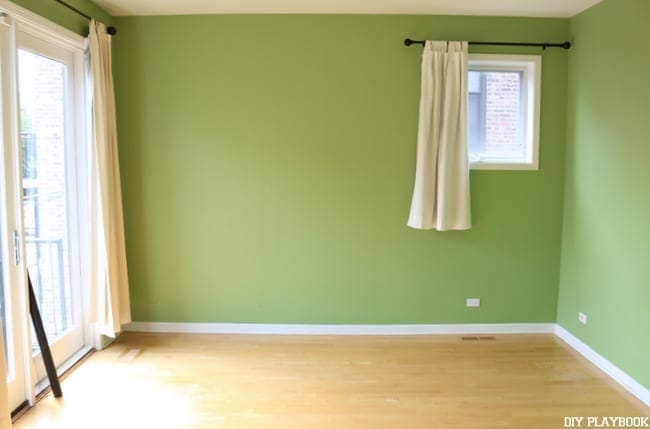 Master bedroom with bright green walls: before our room makeover. 