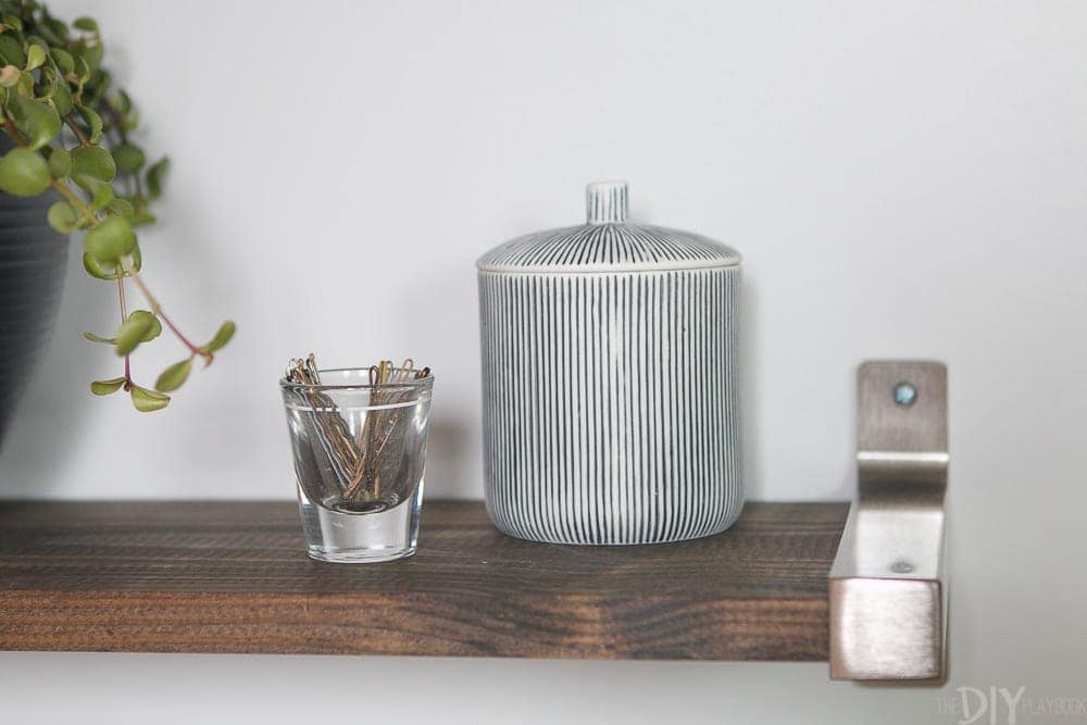 How cute is this little black and white striped clay pot from Norstrom?