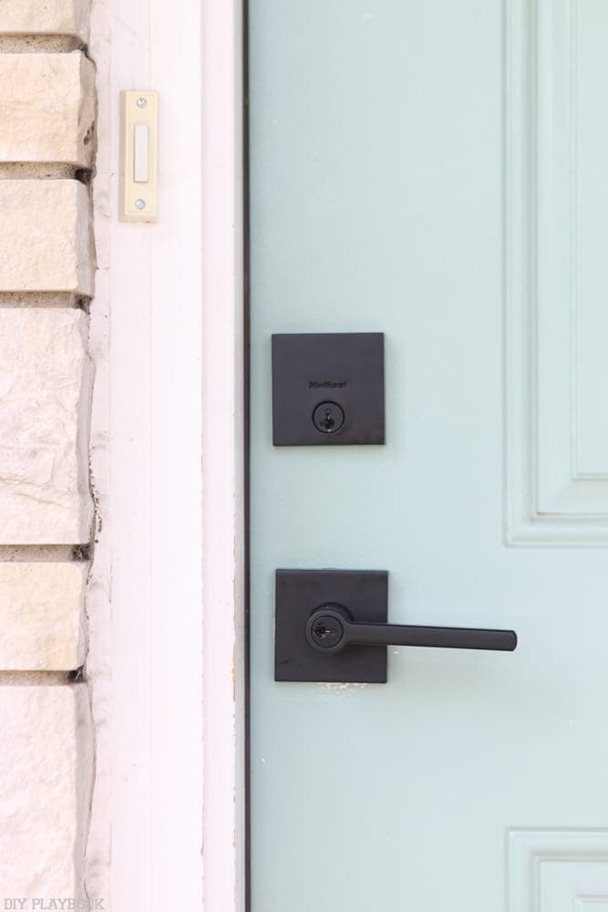 The front door- after, with the new Kwikset knob and lock