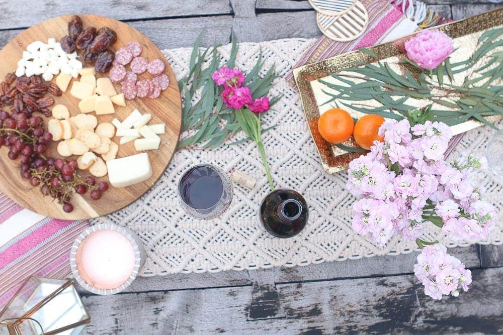 Use the leftover flowers to accessorize and decorate your table as well