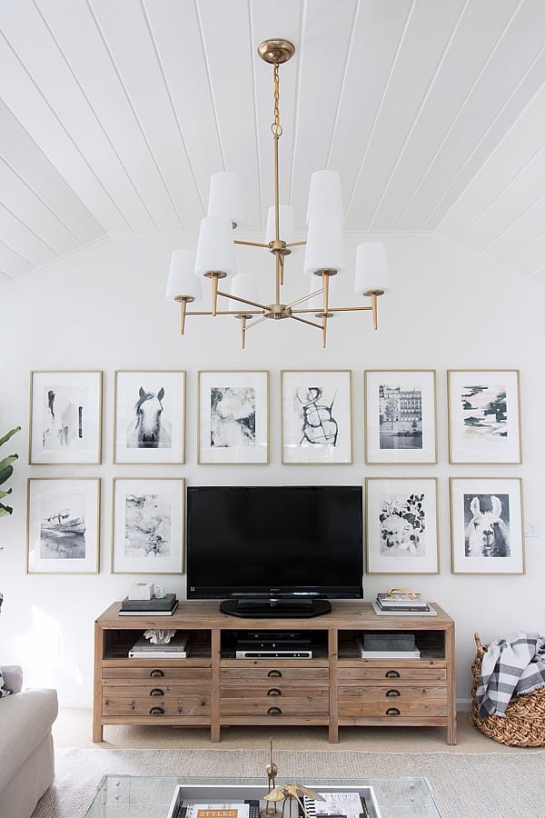 Moving the TV stand to the middle of the room will balance out the space more. 