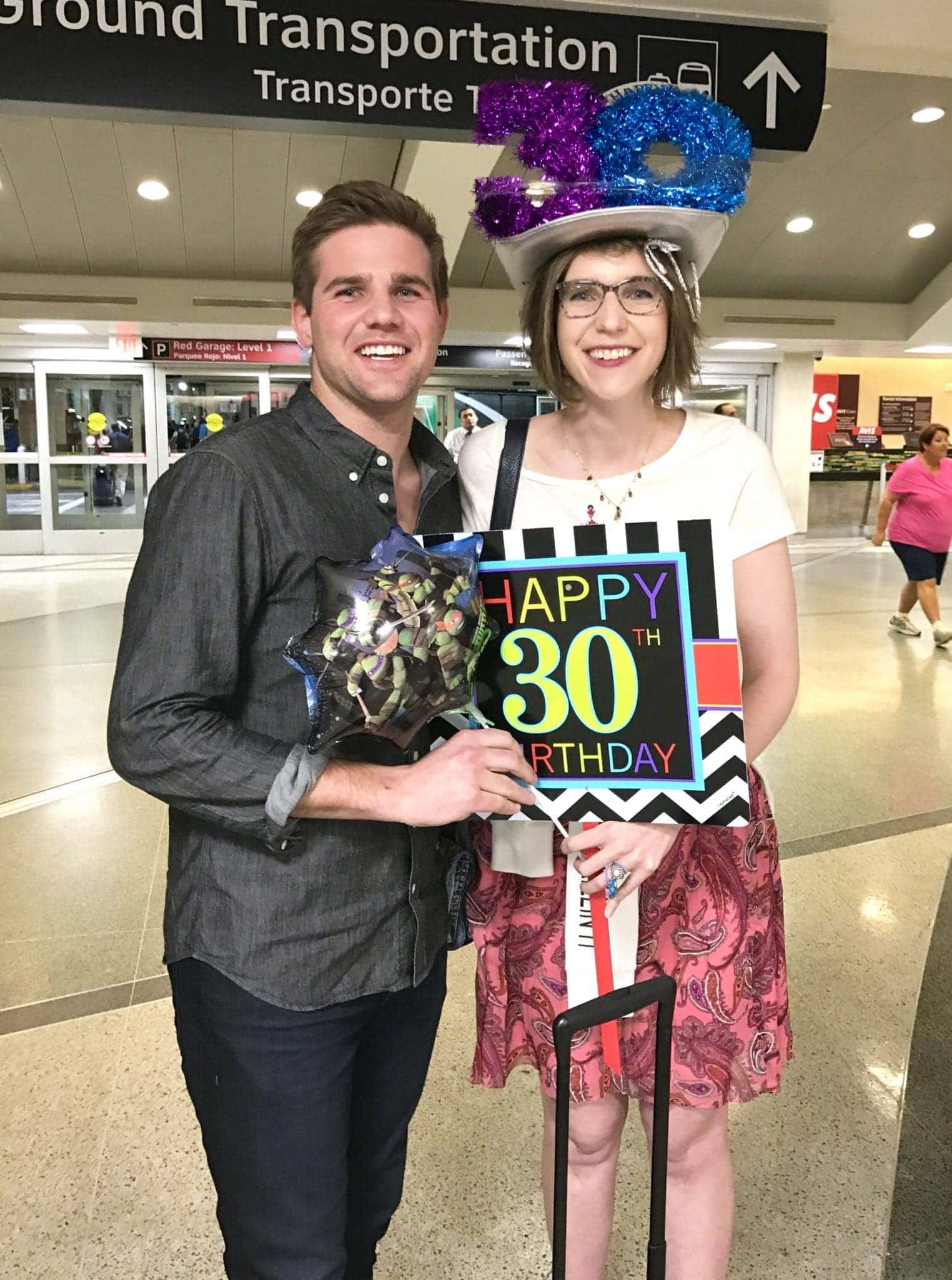 Mike's sister greeted us at the airport with a special birthday surprise for Mike. 