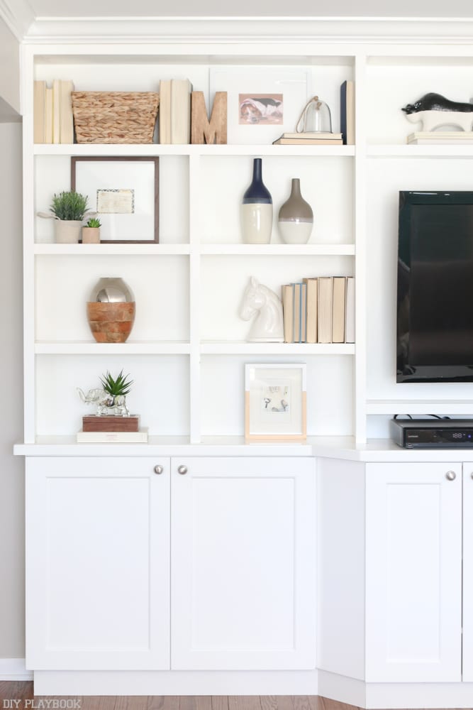 Shelves make it look natural 6 Ways to Decorate with Picture Frames | DIY Playbook