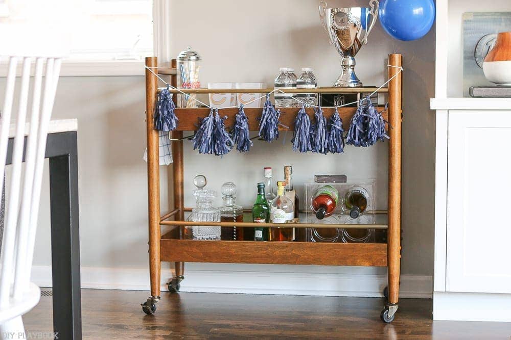 Here's our bar cart, all stocked and decorated with our team's colors for the big game!