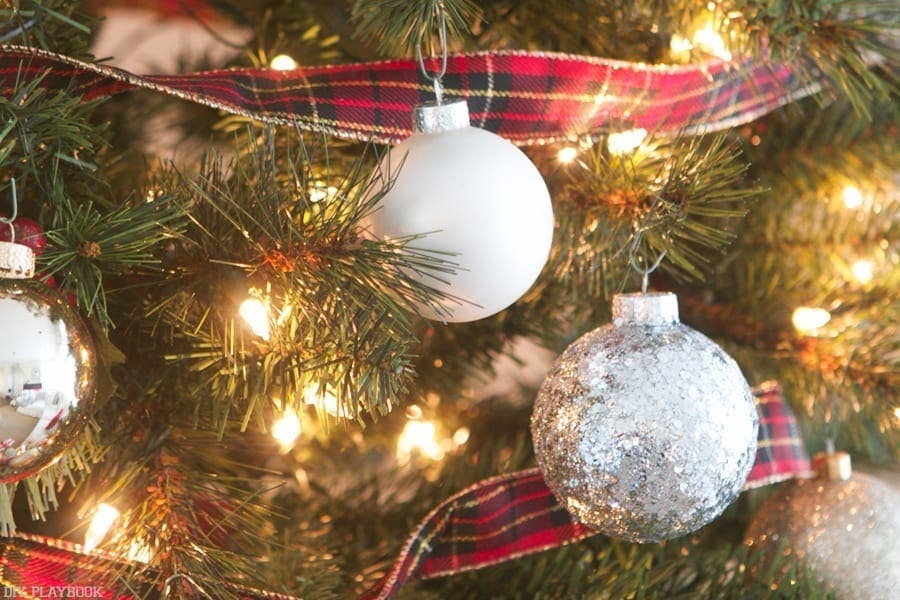 Keep it simple with white, gold, and silver ornaments on the Pretty and Plaid Christmas Tree.