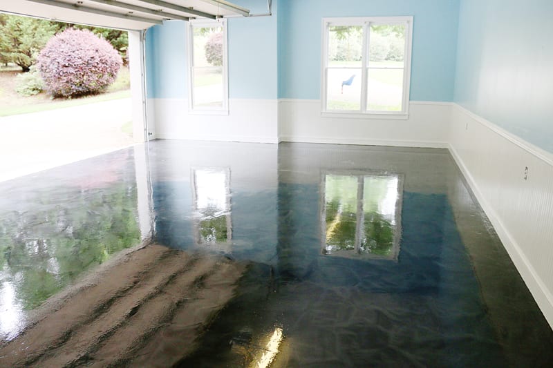 One of my garage plans is to epoxy our garage floor. It looks gorgeous, and will cover up a lot of the cracks and stains. 