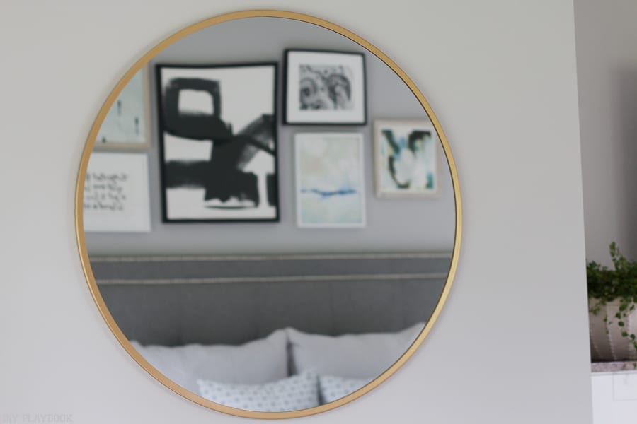 A simple mirror adds the right accent to this wall