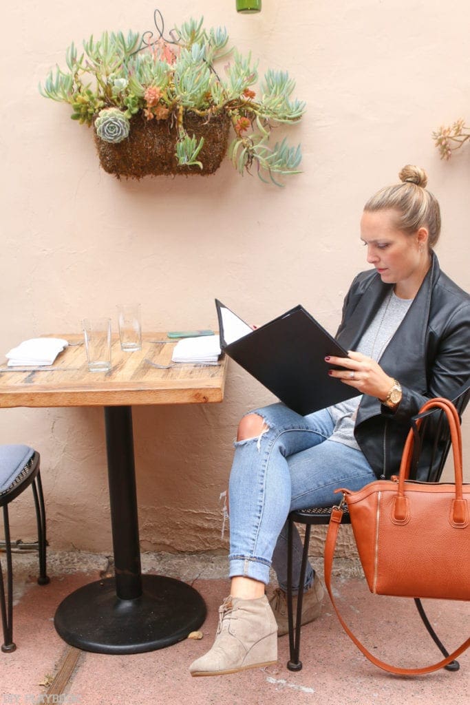 A black leather jacket looks great for casual dining.