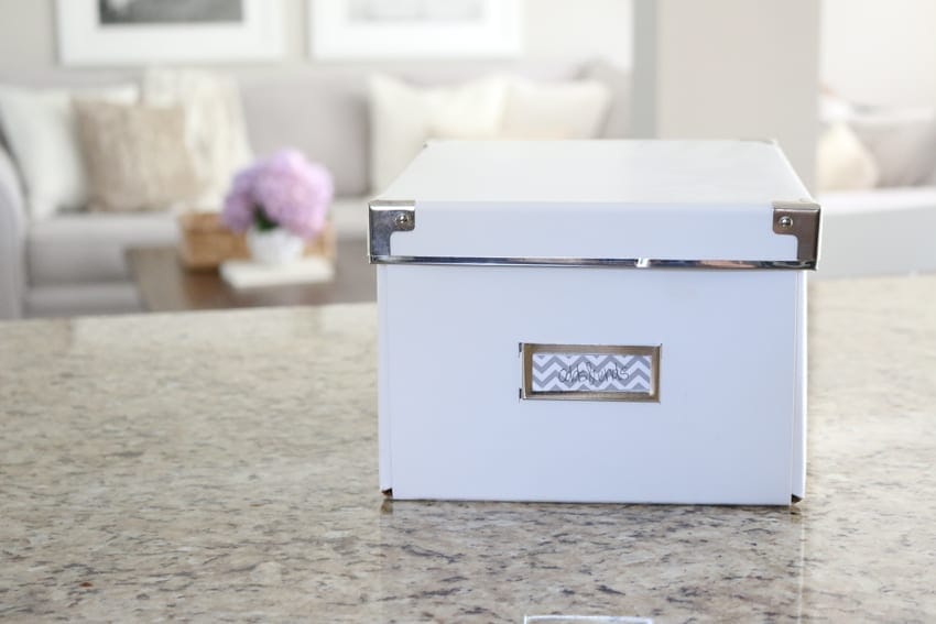 I use a cute white storage box like this one to store little odds and ends like the allen wrench to tighten any loose screws on the chairs. 