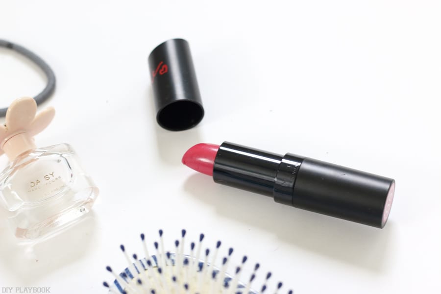 More beauty essentials- lip stick, a small perfume and a hair brush. You never know what you'll need!