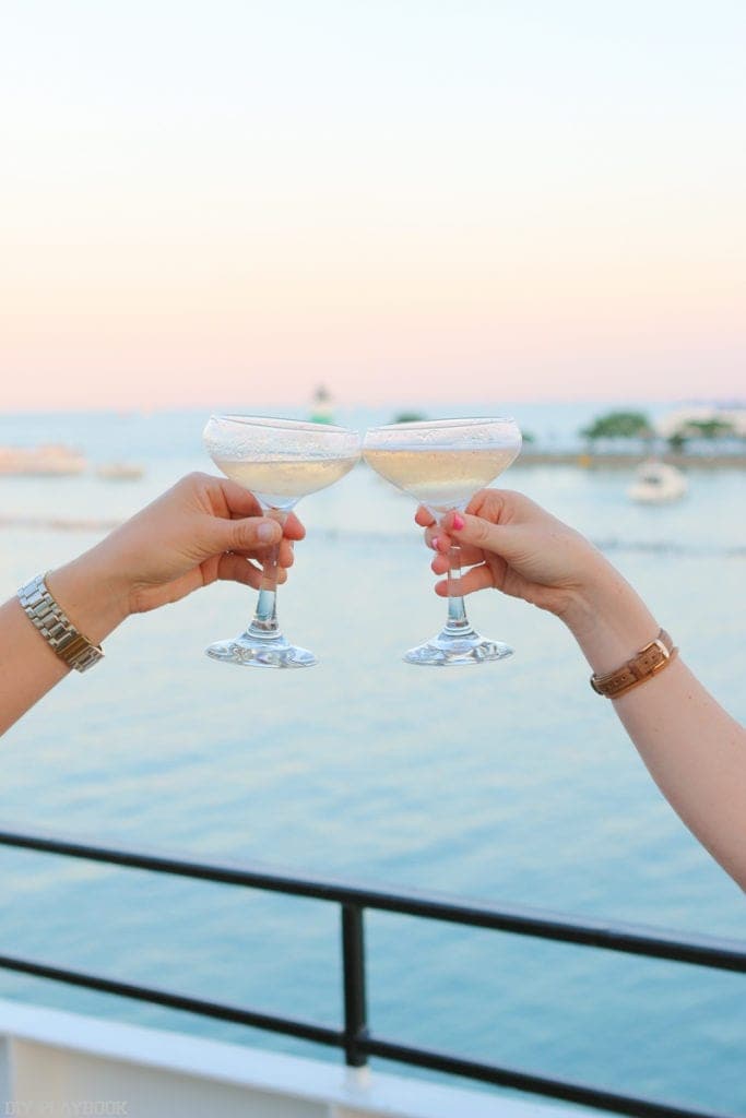 toasting champagne at the chicago pier