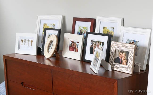 All your photo frames in one place can leave your surfaces feeling cluttered