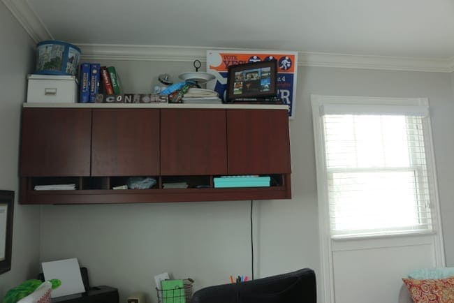 The built-ins in this office space are dark wood and compliment the room. 