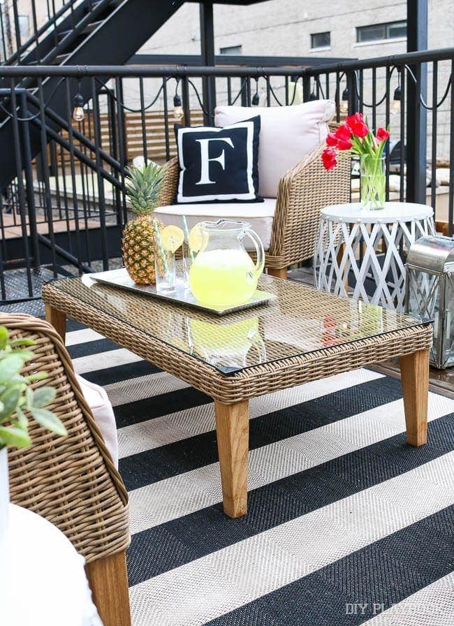 Our new patio furniture from Wayfair includes a couch, two chairs, a table, some great end tables and many throw pillows. 