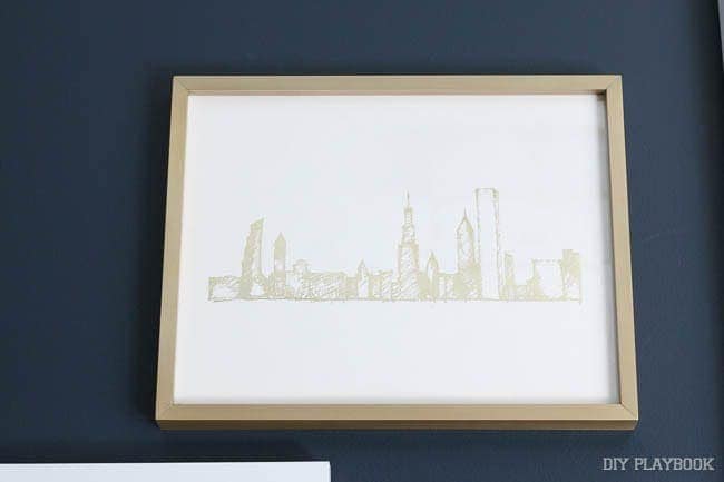 How amazing is this gold Chicago skyline print with a gold frame? So good with the navy wall. 