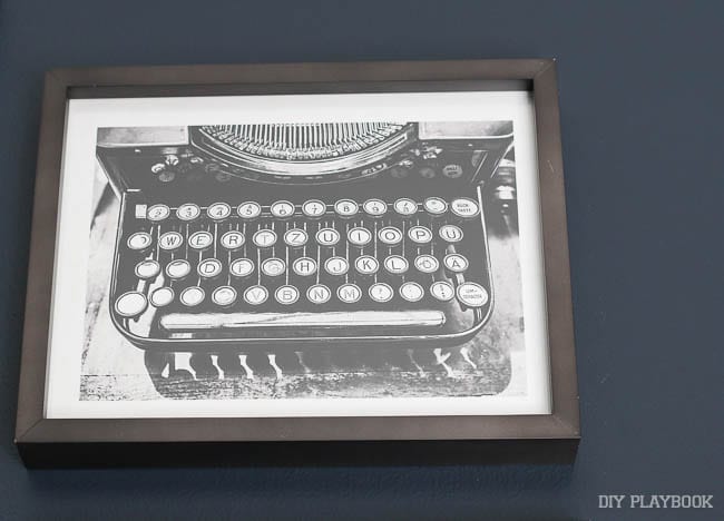 How cute is this vintage typewriter print? I love the brown wood frame too. 