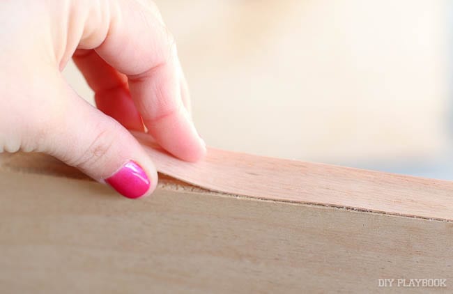 Detail of the wood veneer being applied