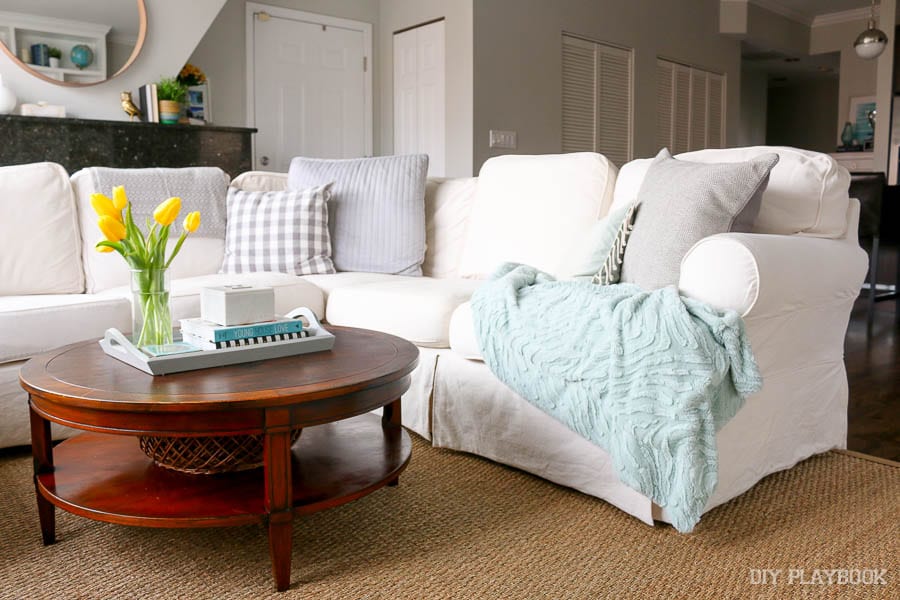 A Throw Blanket is comforting: How to Style Your Couch: Easy DIY Design | DIY Playbook