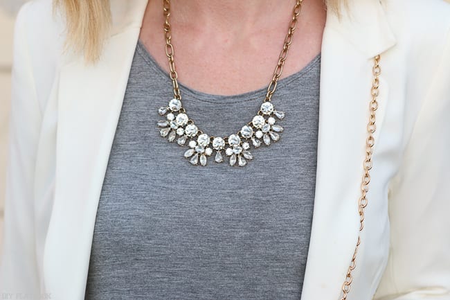 Bridget's favorite sparkly statement necklace with a t shirt and white blazer. 