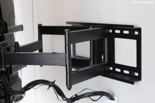 Our flat screen TV is mounted to the wall with heavy duty mounts. 