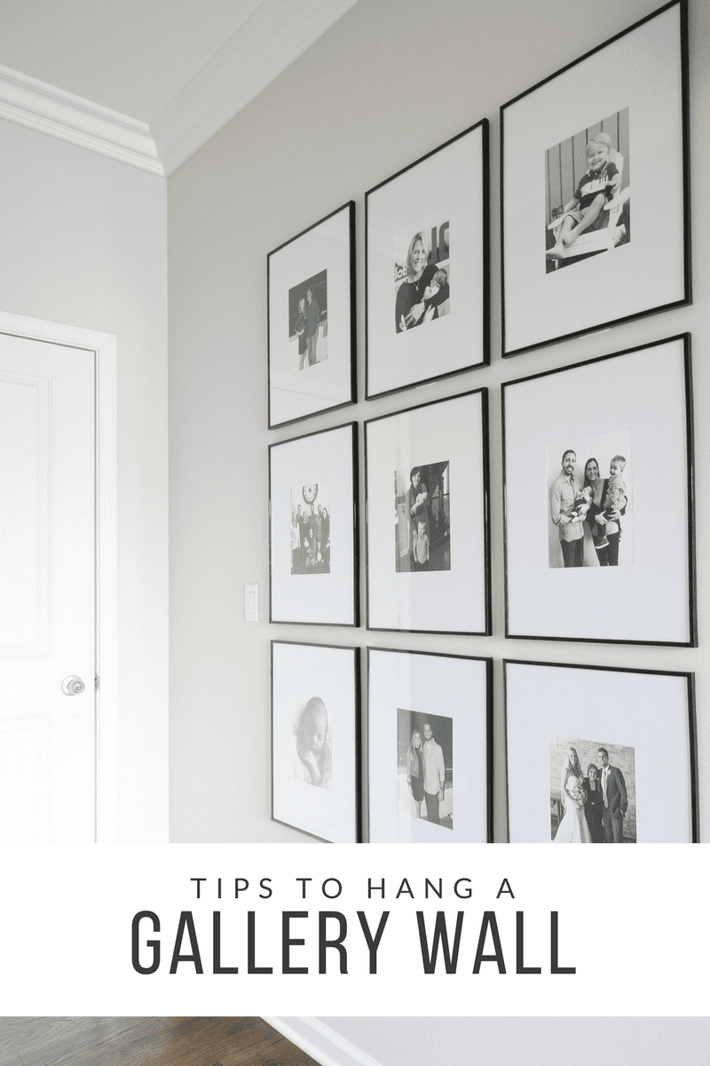 A gorgeous wall of frames in a hallway