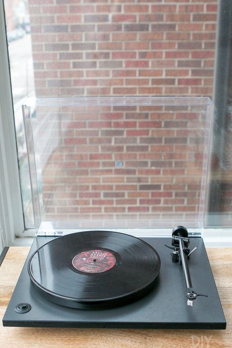 Record player playing Calvin Harris on vinyl. 