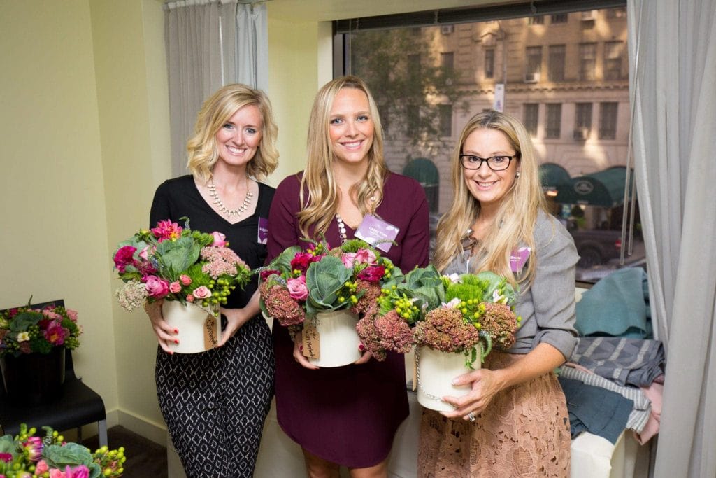 Bridget, Casey, and Jessica after their flower making class