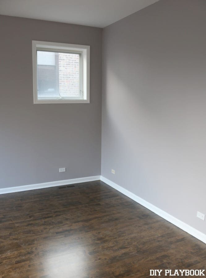 The master bedroom, with the purple-y gray