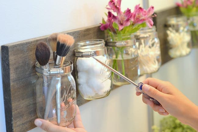 Unscrew the hose clamp to clean the mason jar. 