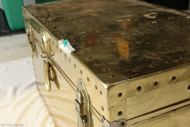 The gold steamer trunk before I refinished it. It was in pretty bad shape but I kinda didn't care because I'd never seen anything like it before!