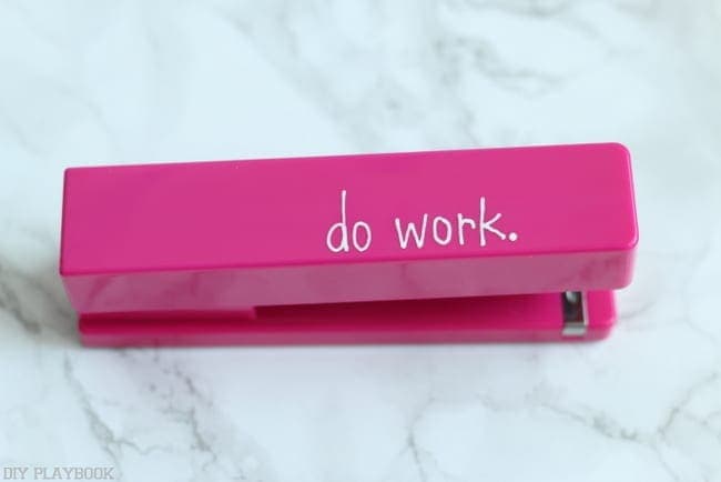 Customize your office supplies with a paint pen like this pink stapler