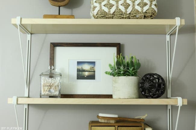 Use actual bathroom accessories:How to Style Your Bathroom Shelves: Easy DIY | DIY Playbook